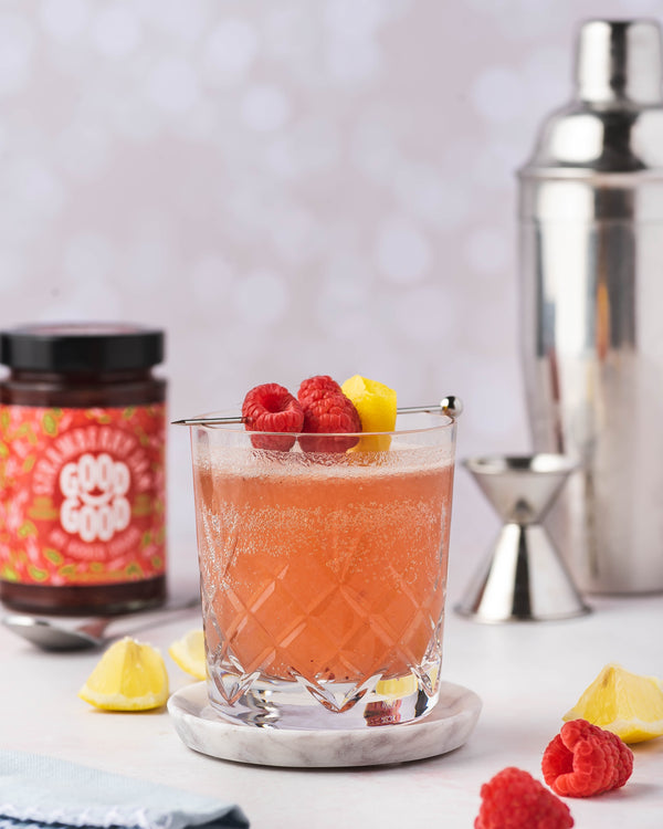 Whiskey sour with raspberry jam